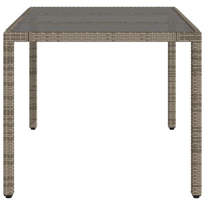 vidaXL Tuintafel met glazen blad 150x90x75 cm poly rattan grijs