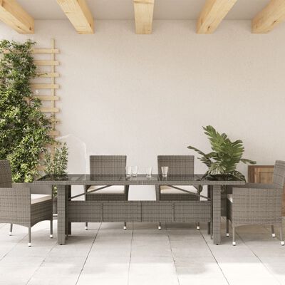 vidaXL Tuintafel met glazen blad 240x90x75 cm poly rattan grijs