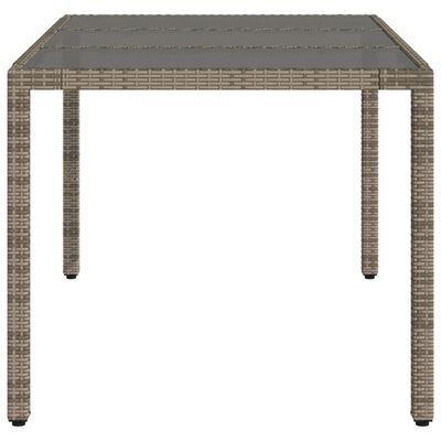 vidaXL Tuintafel met glazen blad 150x90x75 cm poly rattan grijs