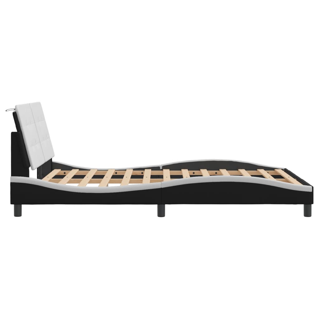 vidaXL Bedframe met hoofdbord kunstleer zwart en wit 140x190 cm